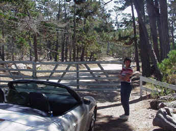 At the unused part of the track with my car (and my wife)